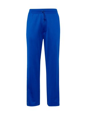 Teplákové nohavice Weekday modrá