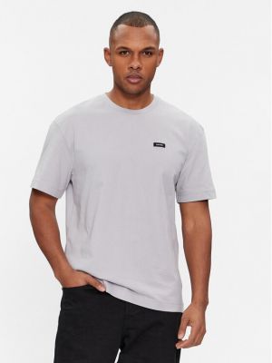 Priliehavé tričko Calvin Klein sivá