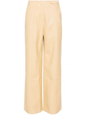 Spodnie skórzane Nanushka żółte