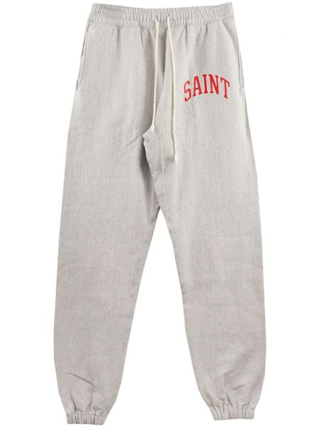 Bavlnené teplákové nohavice s potlačou Saint Mxxxxxx sivá