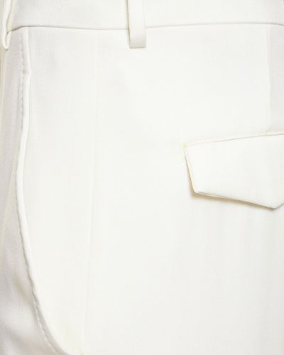 Vlněné saténové kalhoty relaxed fit Ann Demeulemeester bílé