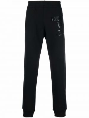 Slim fit sportovní kalhoty s potiskem Moschino černé