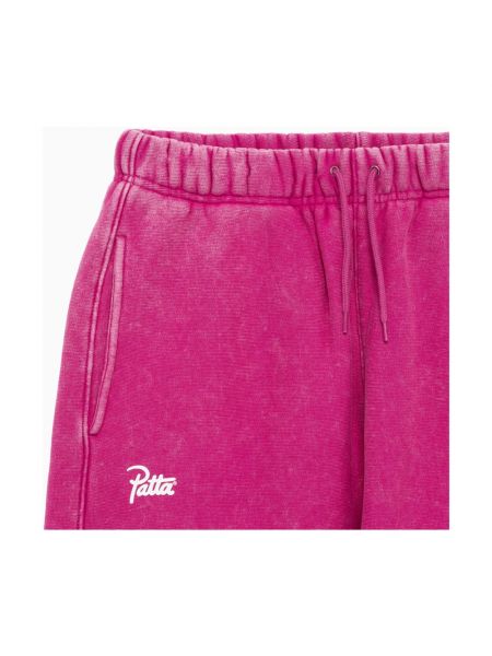 Spodnie sportowe Patta różowe