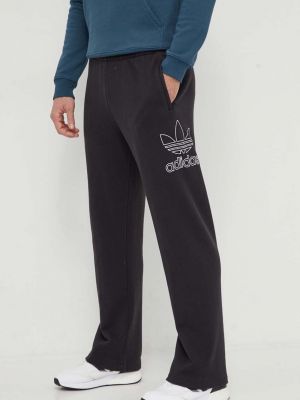 Spodnie sportowe bawełniane z nadrukiem Adidas Originals czarne