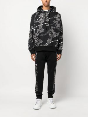 Pantalon de joggings en coton à imprimé Versace Jeans Couture noir