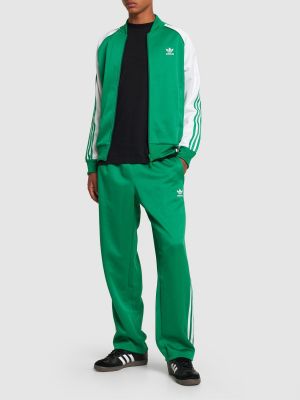 Pantaloni cu dungi Adidas Originals verde