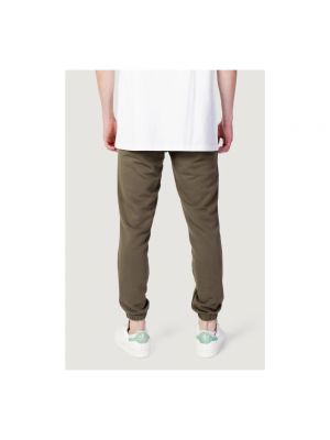 Pantalones de chándal de algodón con bolsillos New Balance verde
