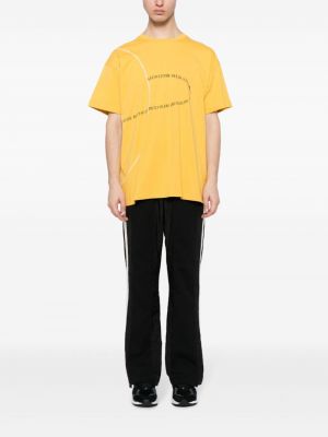 T-shirt avec imprimé slogan en coton à imprimé Mostly Heard Rarely Seen jaune