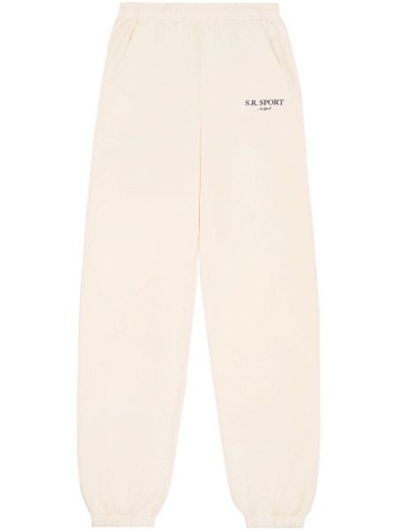 Bavlnené teplákové nohavice Sporty & Rich biela