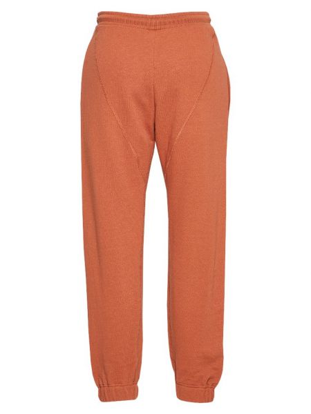 Spodnie sportowe Reebok X Victoria Beckham pomarańczowe