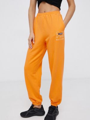 Spodnie sportowe bawełniane P.e Nation pomarańczowe