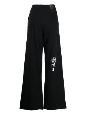Bavlněné sportovní kalhoty s potiskem Raf Simons černé
