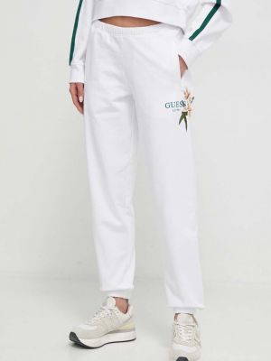 Bavlněné sportovní kalhoty s aplikacemi Guess bílé
