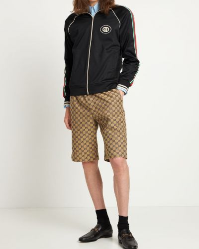 Spodnie bawełniane Gucci beżowe