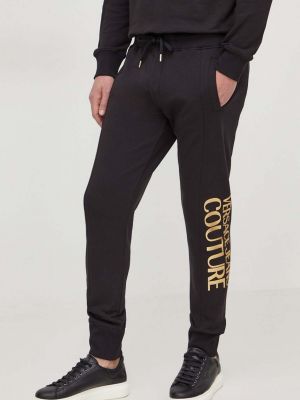 Spodnie sportowe bawełniane z nadrukiem Versace Jeans Couture czarne