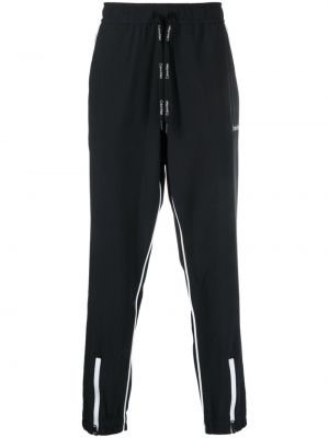 Στενό παντελόνι με σχέδιο Calvin Klein μαύρο