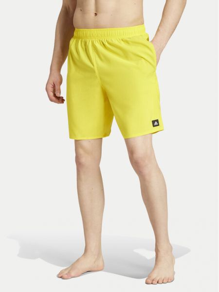 Priliehavé šortky Adidas žltá