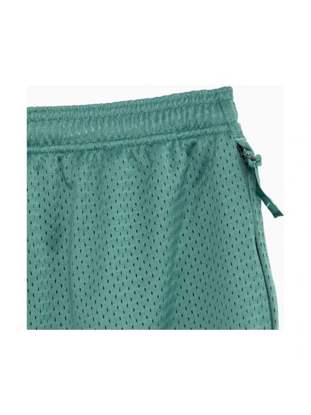 Pantalones cortos con cremallera con bolsillos de malla Nike verde