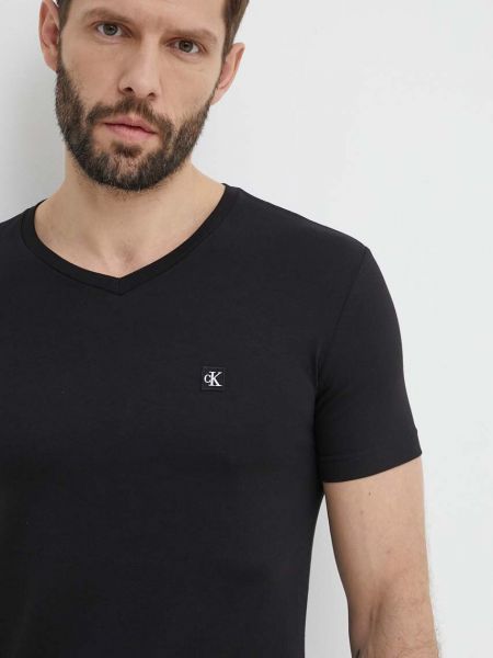 Koszulka bawełniana z dekoltem w serek Calvin Klein Jeans czarna
