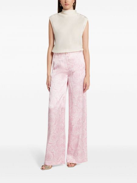 Saténové kalhoty relaxed fit Versace růžové