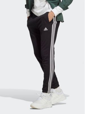 Pruhované priliehavé teplákové nohavice Adidas čierna