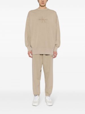Siuvinėtas džemperis apvaliu kaklu Calvin Klein ruda