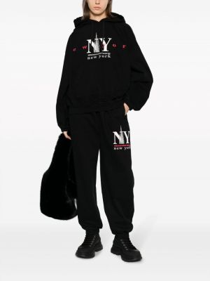 Bavlněné sportovní kalhoty s potiskem Alexander Wang černé
