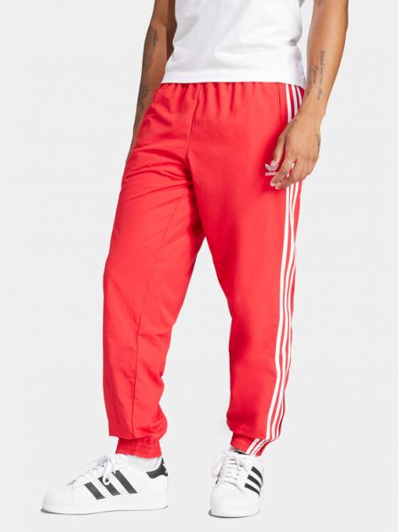 Pletené priliehavé teplákové nohavice Adidas červená