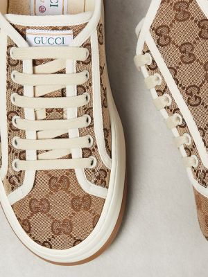Sneakersy na platformie z nadrukiem Gucci