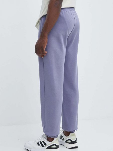 Спортивные штаны с аппликацией Champion фиолетовые