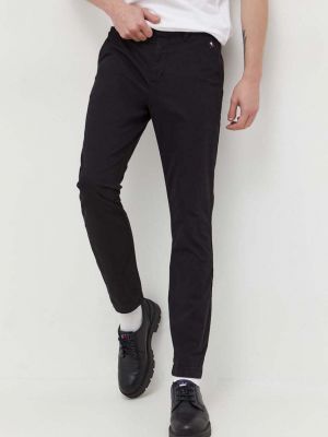 Černé jednobarevné kalhoty Tommy Jeans