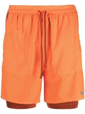 Priliehavé šortky Nike oranžová