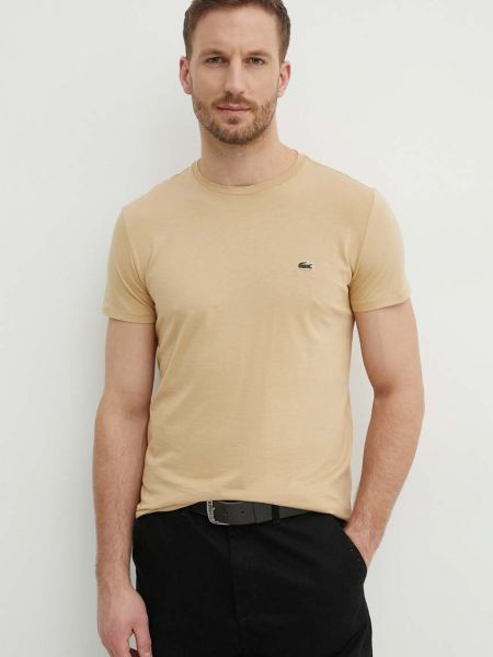 Koszulka bawełniana w jednolitym kolorze Lacoste beżowa