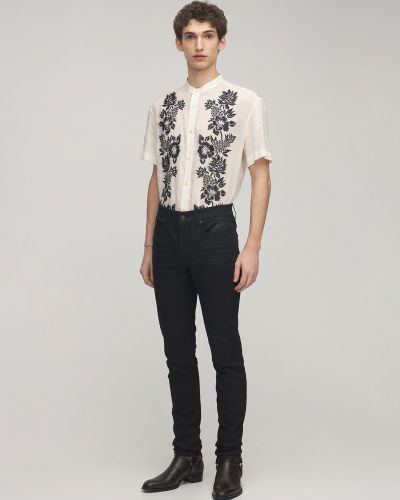 Bavlnené skinny fit džínsy s nízkym pásom Saint Laurent čierna