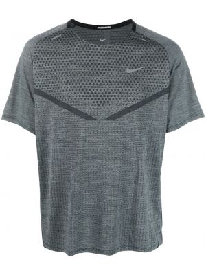 Priliehavé tričko Nike sivá