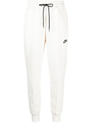 Fleecové sportovní kalhoty s potiskem Nike
