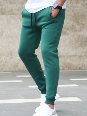 Slim fit teplákové nohavice Madmext zelená