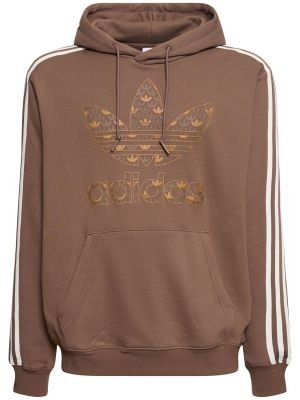 Medvilninis džemperis su gobtuvu Adidas Originals ruda