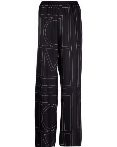 Pantaloni con stampa Toteme nero