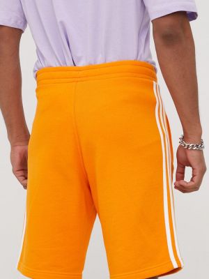 Pantaloni din bumbac Adidas Originals portocaliu