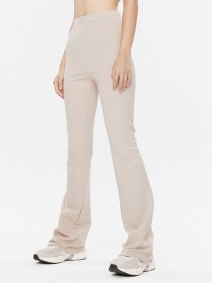 Bavlnené priliehavé nohavice Calvin Klein Jeans béžová