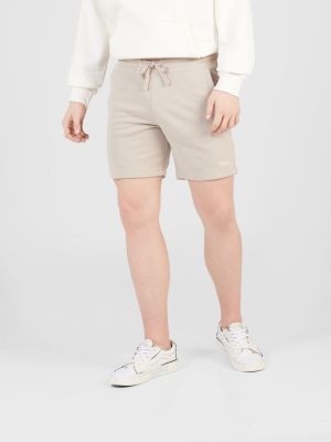 Teplákové nohavice Hollister biela
