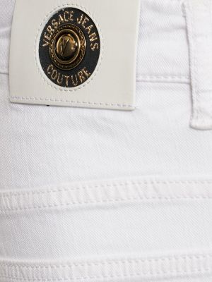 Jeansy skinny bawełniane Versace Jeans Couture białe