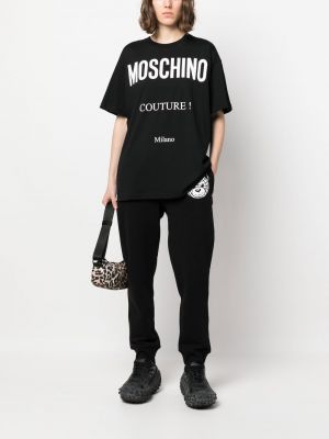 Pantalon de joggings en coton Moschino noir