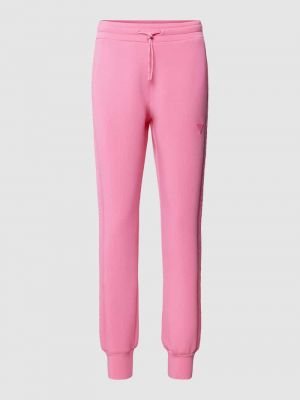 Spodnie sportowe Guess Activewear różowe