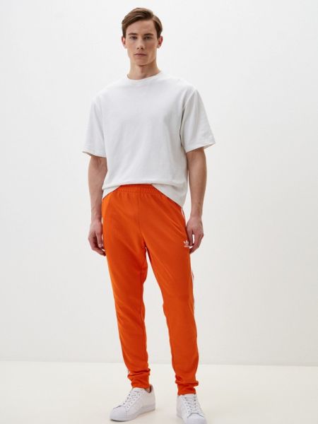 Спортивные штаны Adidas Originals оранжевые
