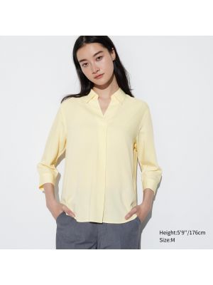 Шелковая блузка Uniqlo желтая