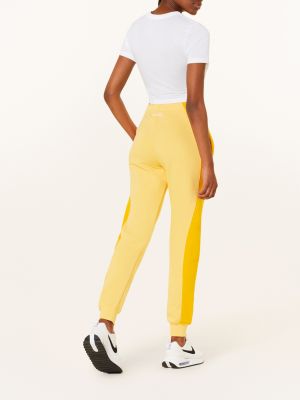 Spodnie sportowe Nike żółte