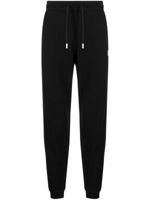 Czarne spodnie sportowe bawełniane z nadrukiem Ea7 Emporio Armani