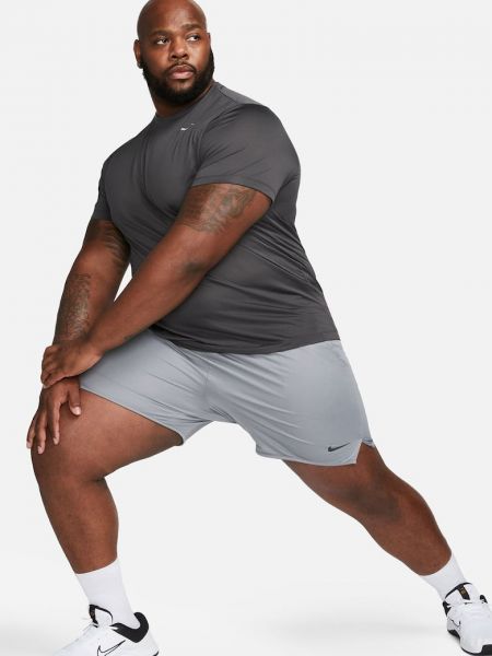 Спортивные штаны с карманами Nike серые